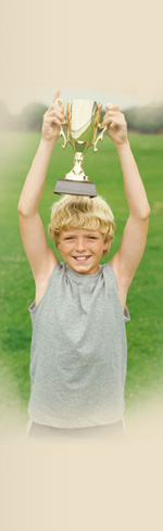 boy with trophy